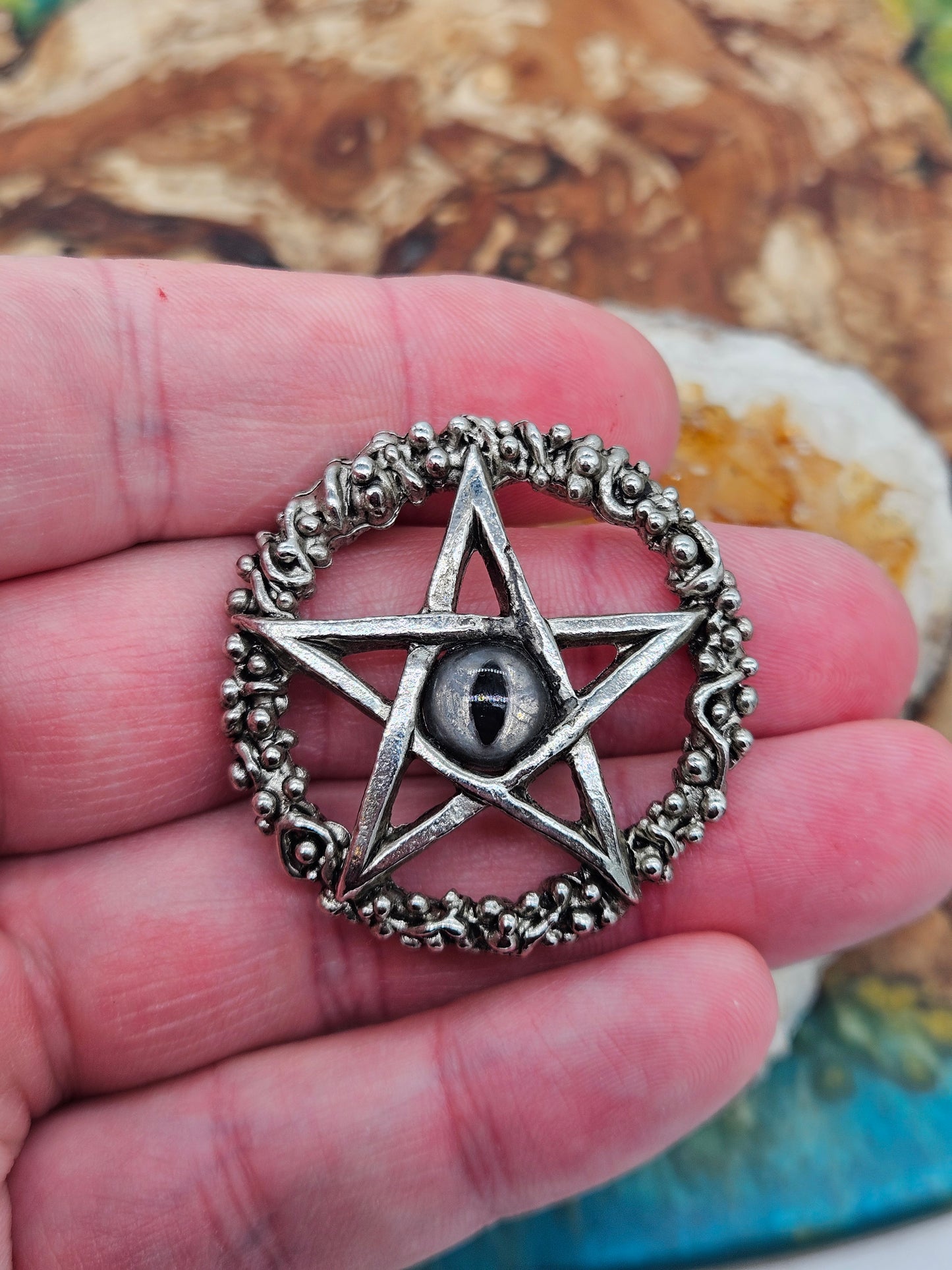 Axel Stocks Pentagram pendant with silver eye.
