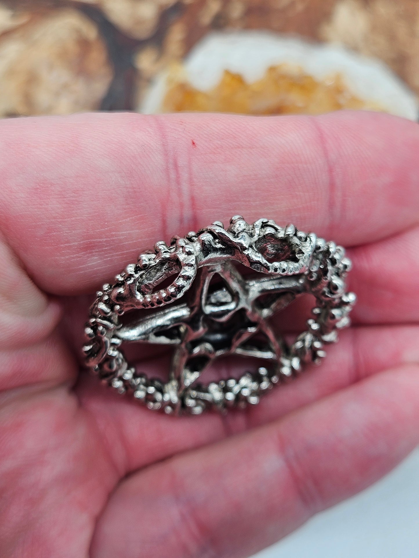 Axel Stocks Pentagram pendant with silver eye.